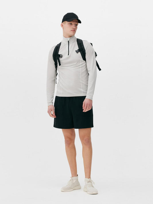 Áo hiệu suất Half-Zip