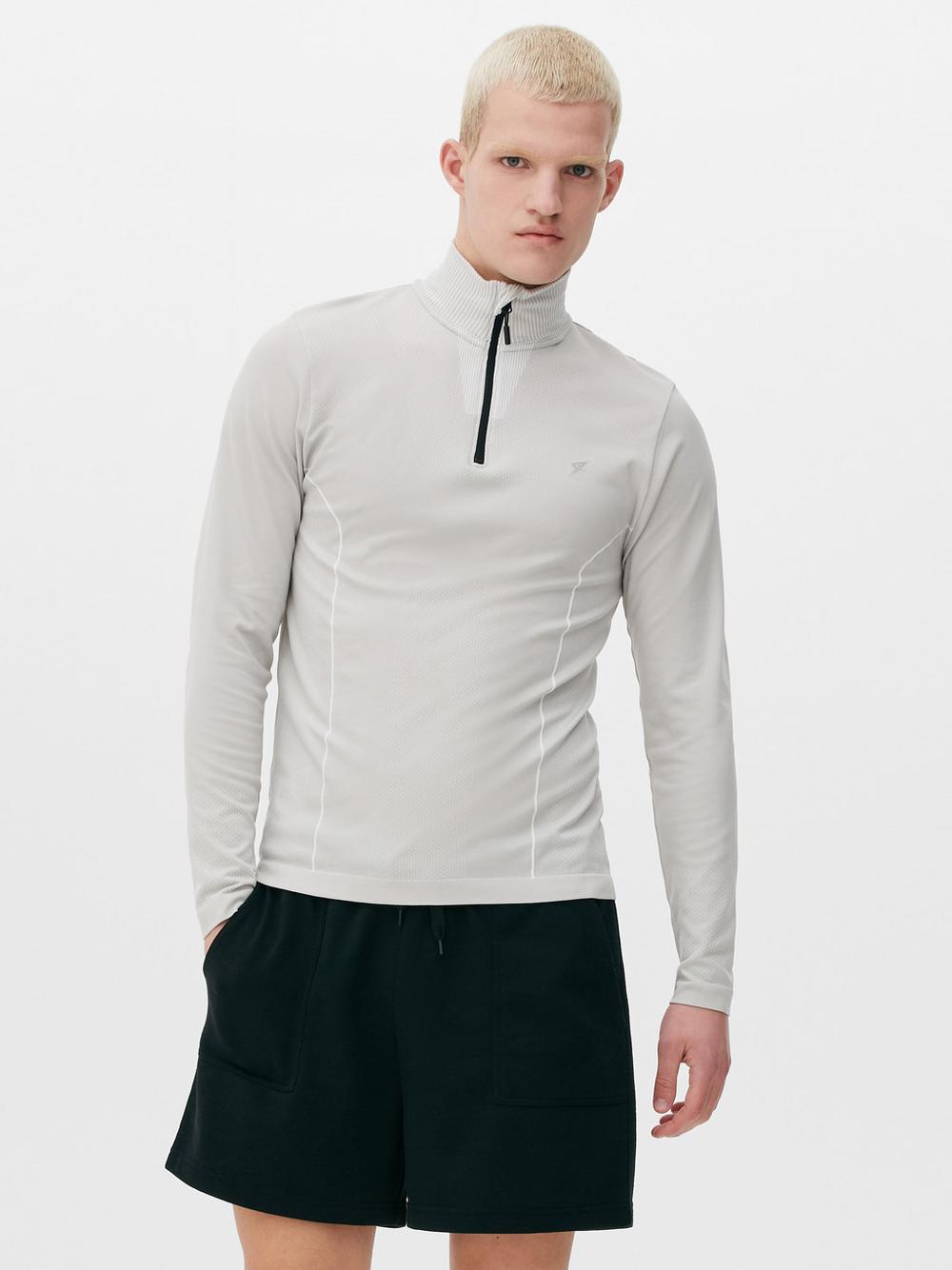 Áo hiệu suất Half-Zip