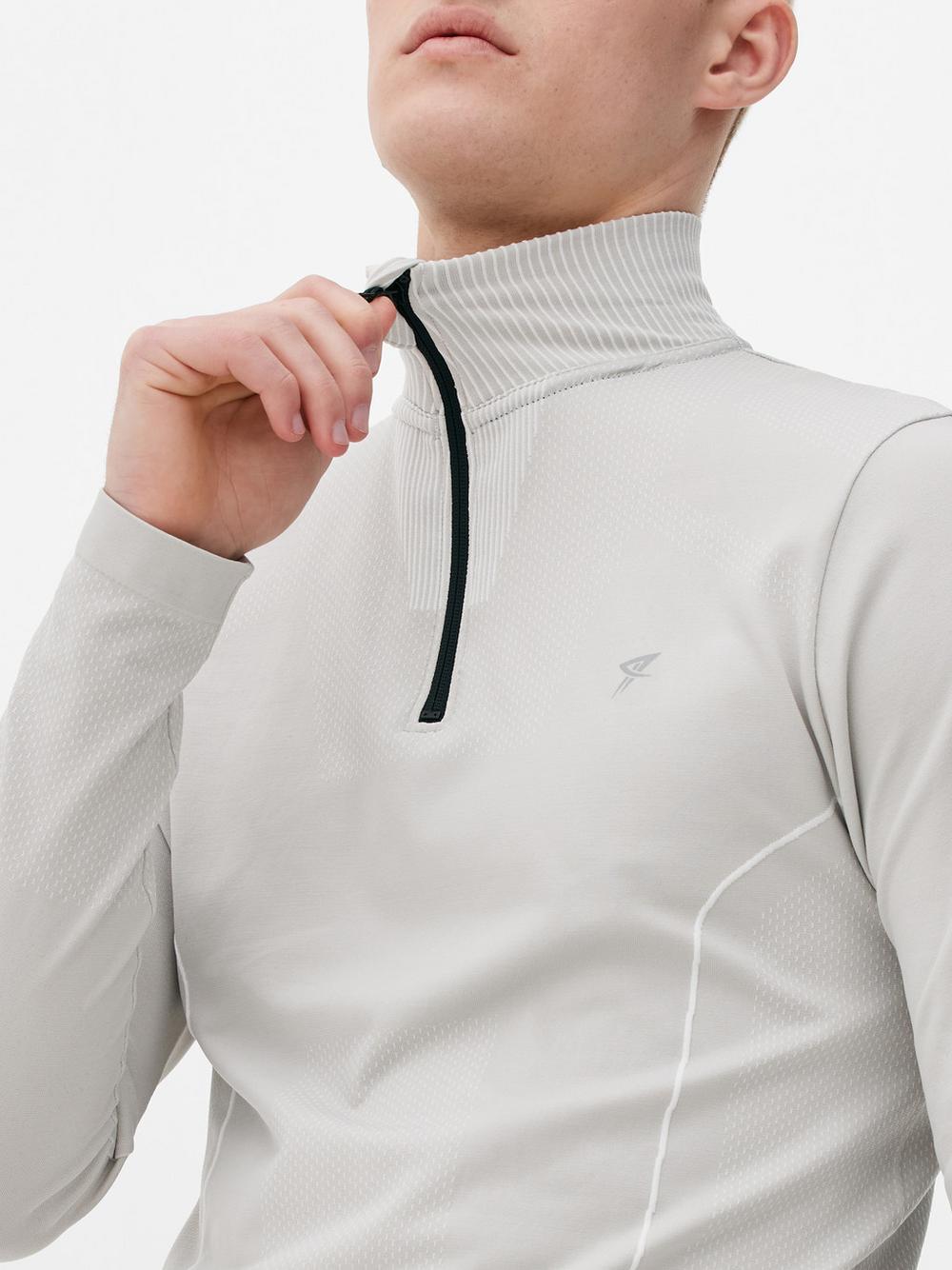 Áo hiệu suất Half-Zip