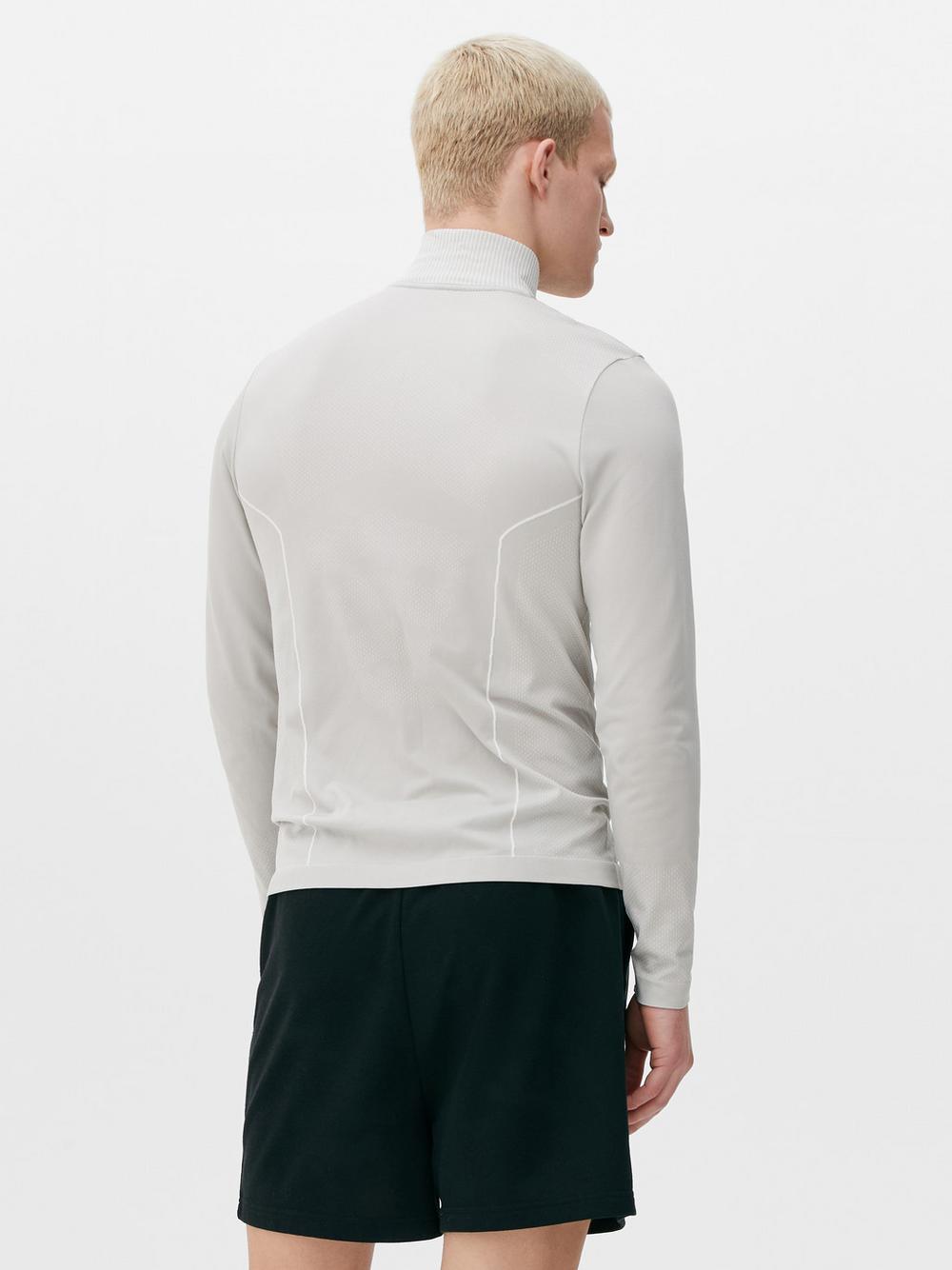 Áo hiệu suất Half-Zip