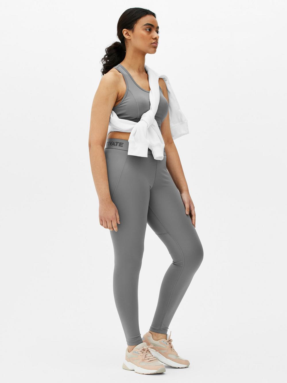 Quần legging hiệu suất Motivate