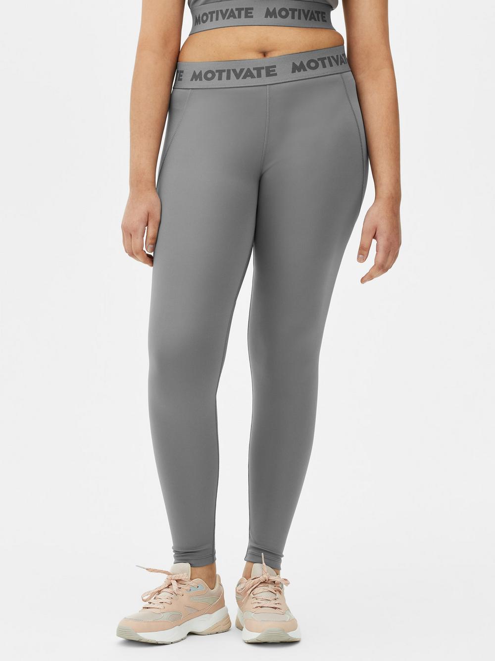 Quần legging hiệu suất Motivate